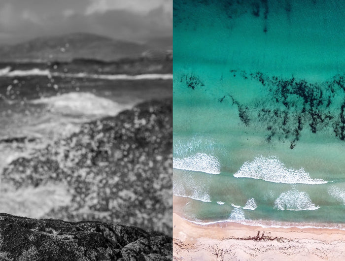 Wide coastal view of the Isle of Harris with turquoise sea, white sand beach and rugged hills under open sky