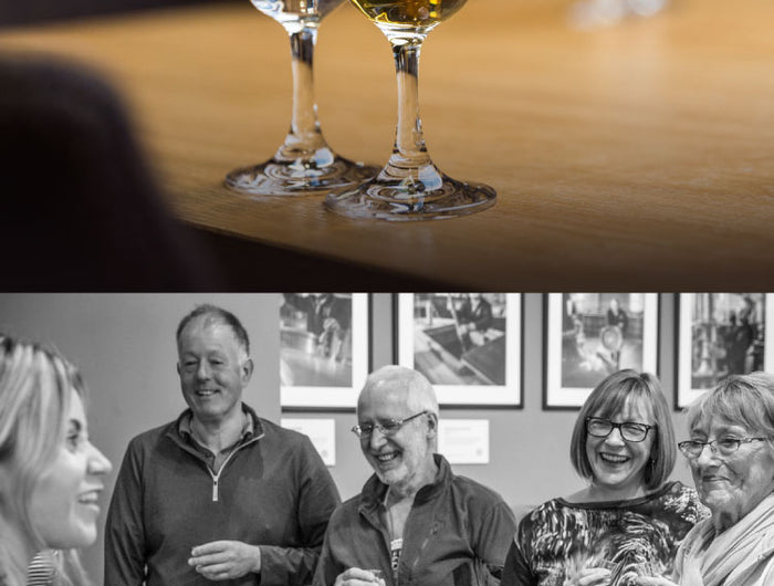 Two images stacked, the top is of two glasses of whisky on a table and the bottom is a black and white image of a group of people